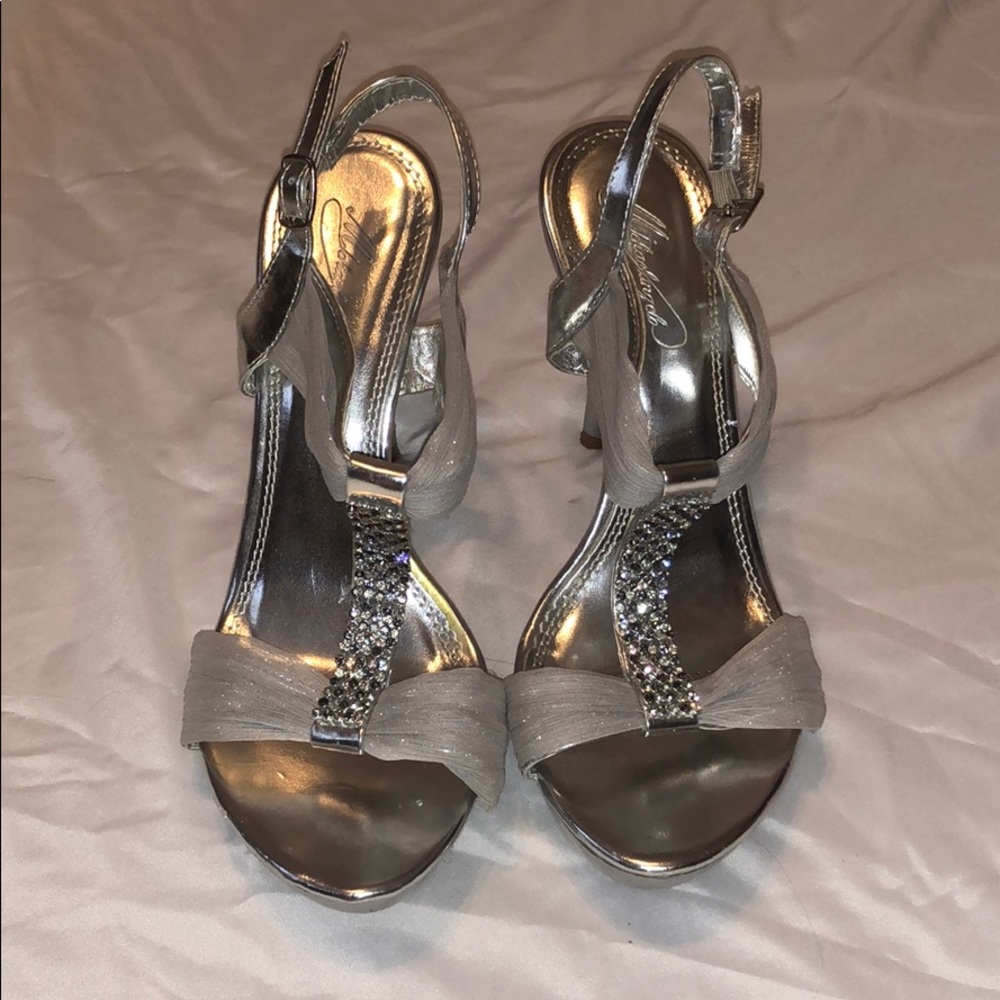 silver michaelangelo studded heels